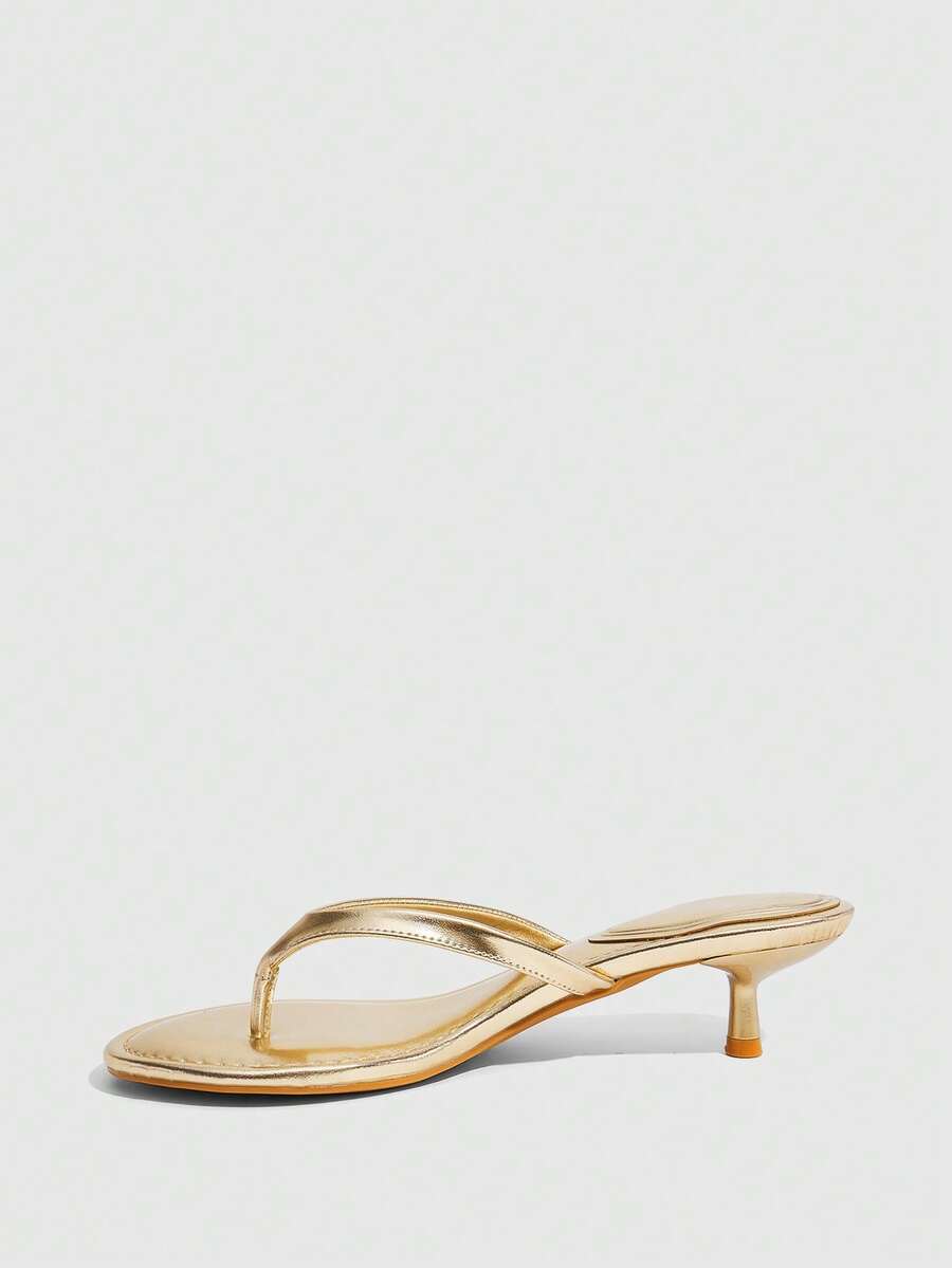 Women's kitten heel flip flop sandals featuring sleek PU leather straps, open toe, and low kitten heel.