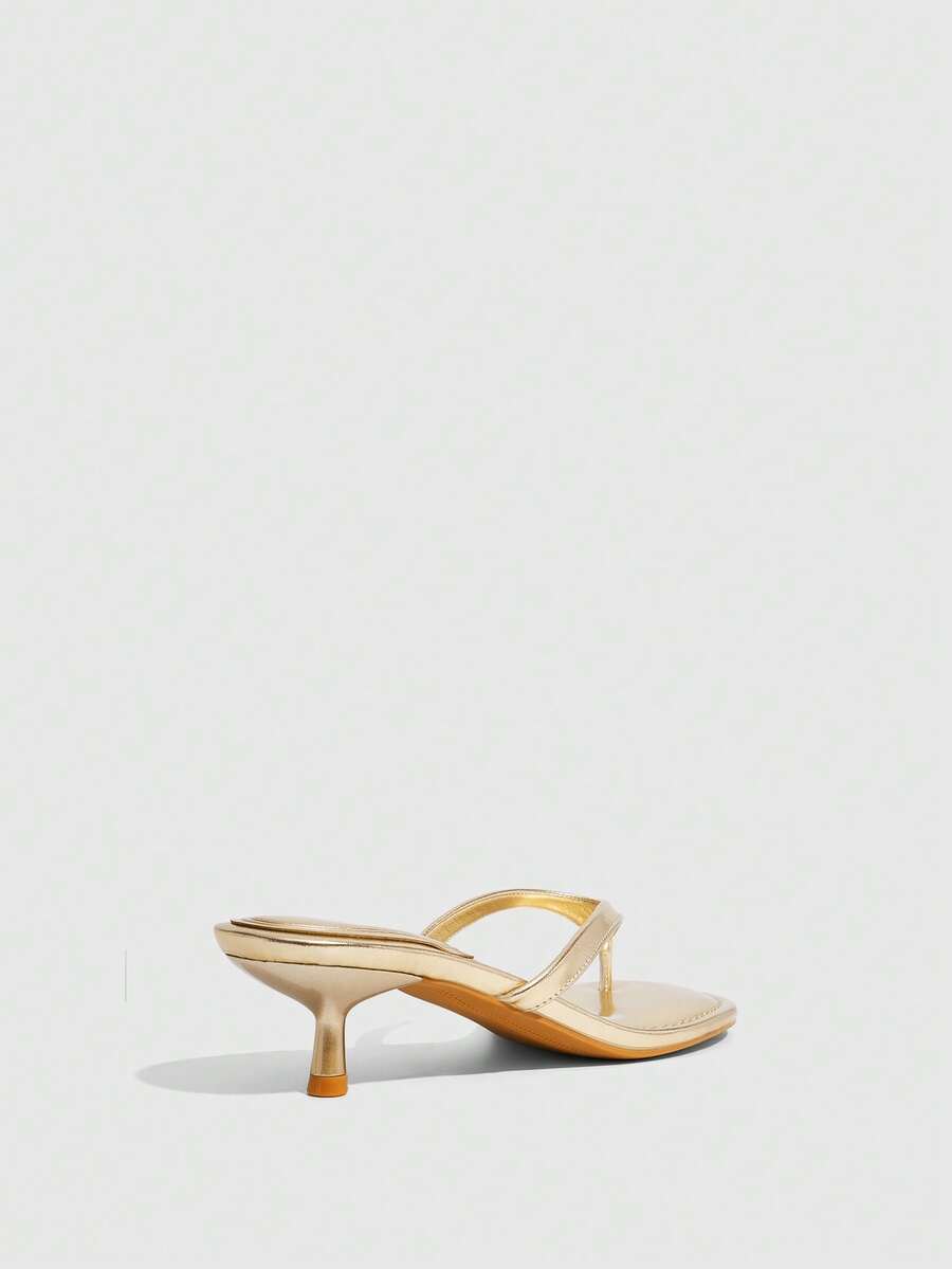 Women's kitten heel flip flop sandals featuring sleek PU leather straps, open toe, and low kitten heel.