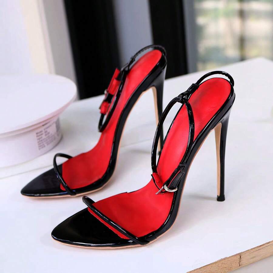 Women's black open toe thin high heel sandals with button strap and red bottom sole