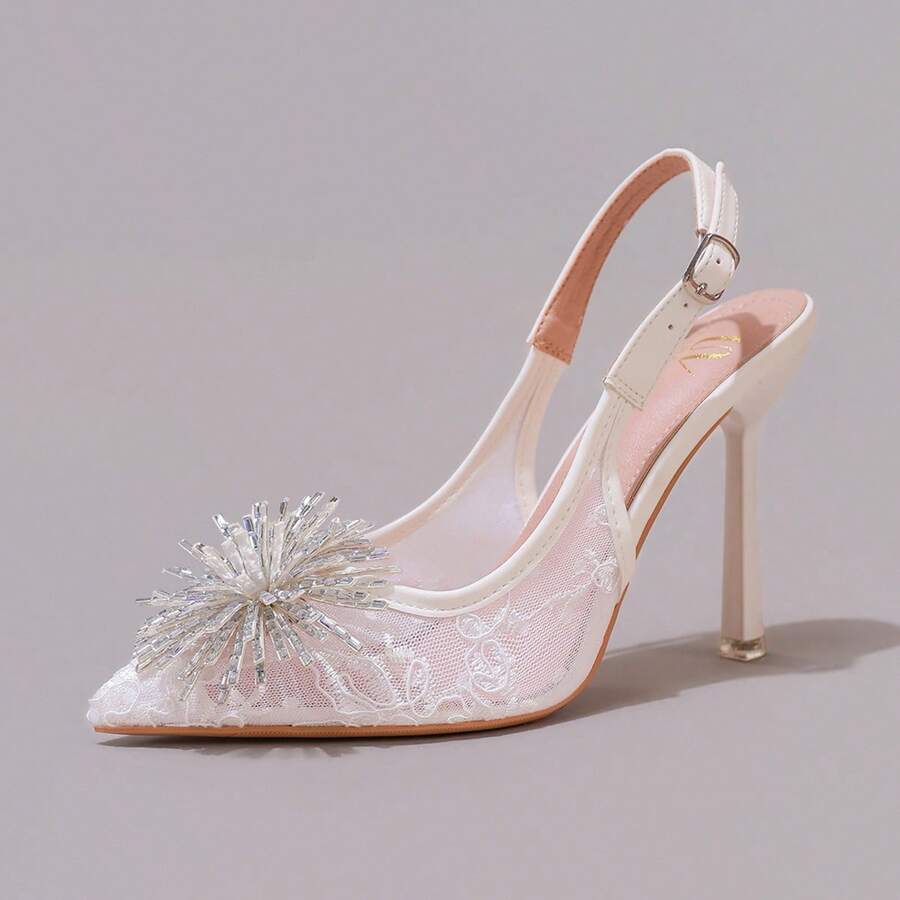 White pointed toe high heel stiletto sandals featuring lace patchwork, fringe trim, and an oversized bowknot accent.
