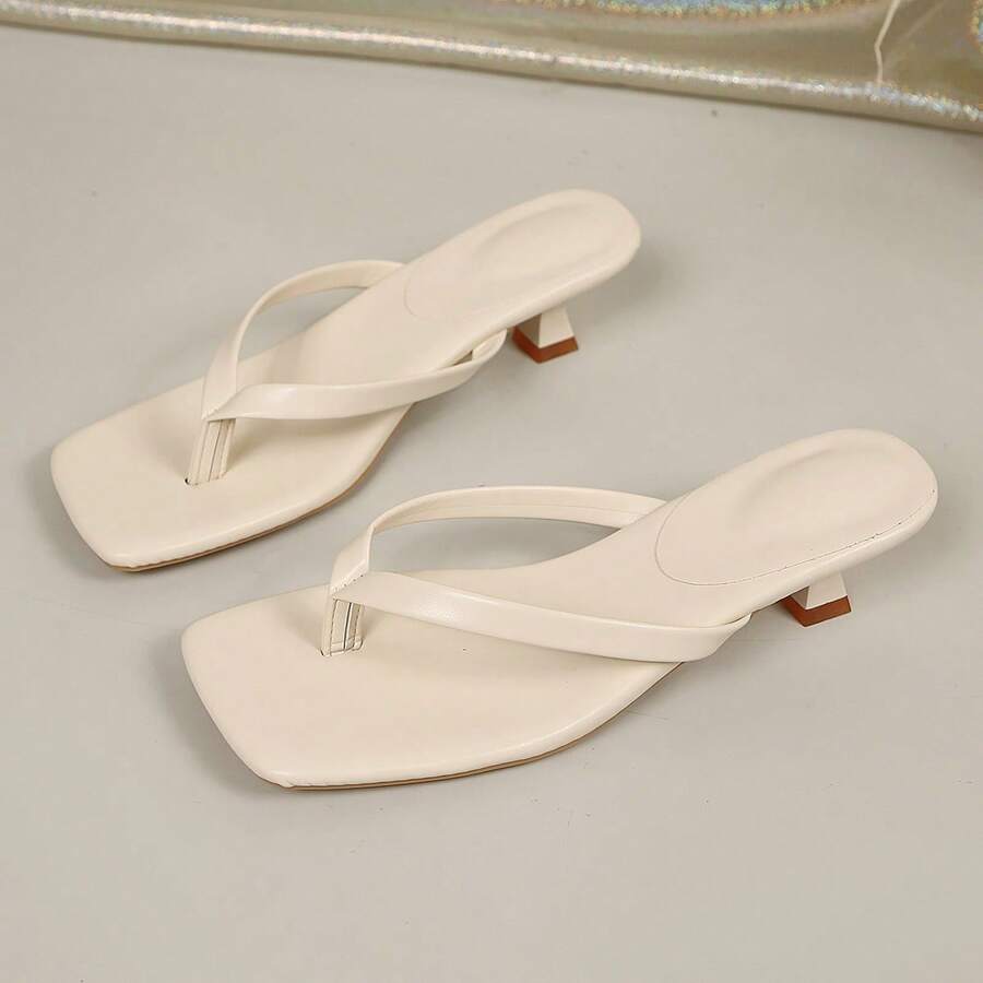 Women's square toe kitten heel thong sandals featuring a sleek toe-post strap and low heel design