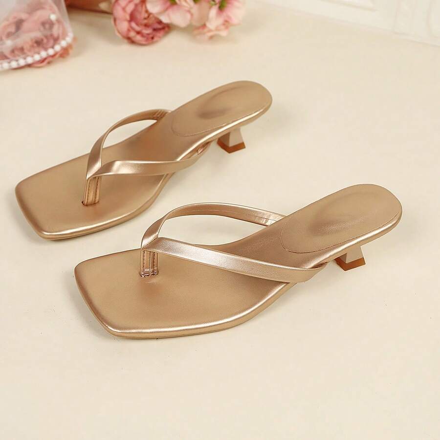 Women's square toe kitten heel thong sandals featuring a sleek toe-post strap and low heel design