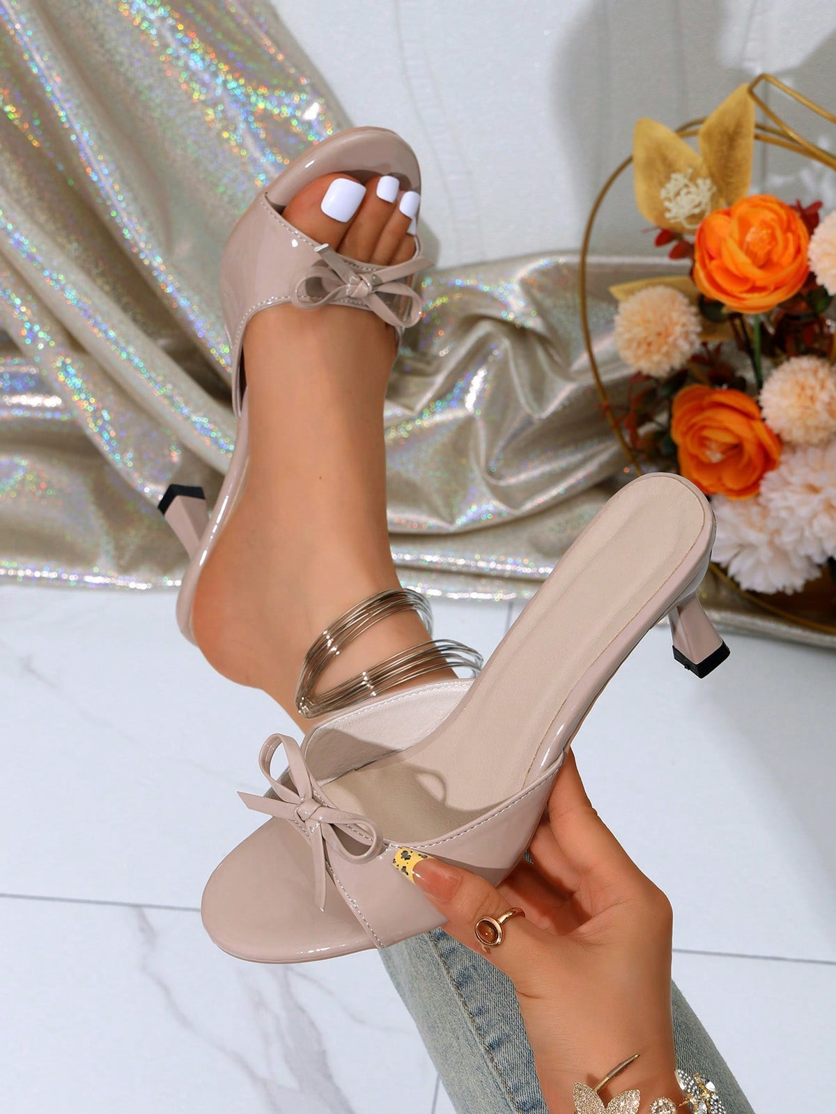 Women's open toe stiletto sandals in PU leather featuring slip-on slingback straps and bow accents for summer parties