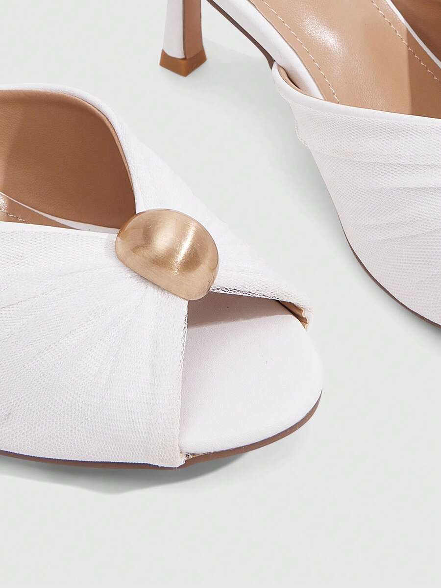 Pair of women's open toe kitten heel sandals and mules in sleek PU leather with rubber soles.