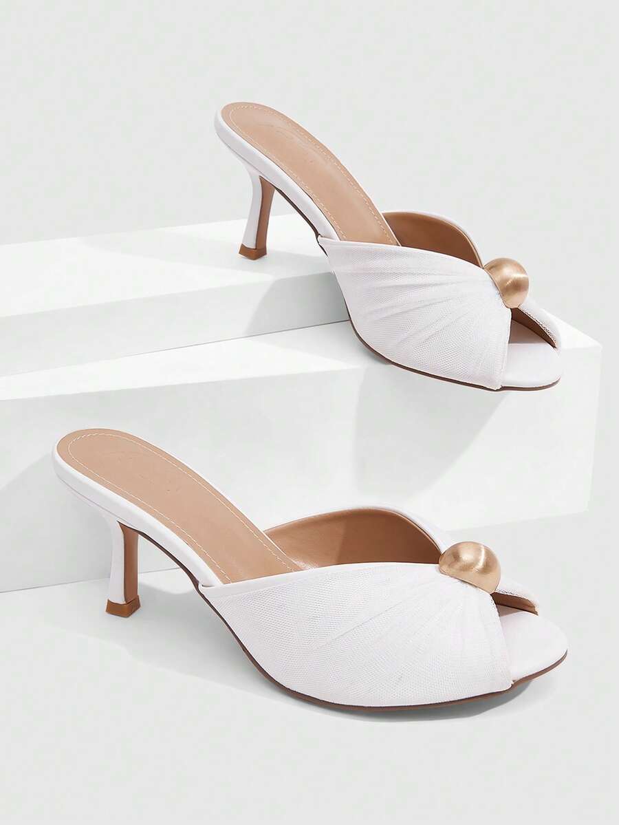 Pair of women's open toe kitten heel sandals and mules in sleek PU leather with rubber soles.