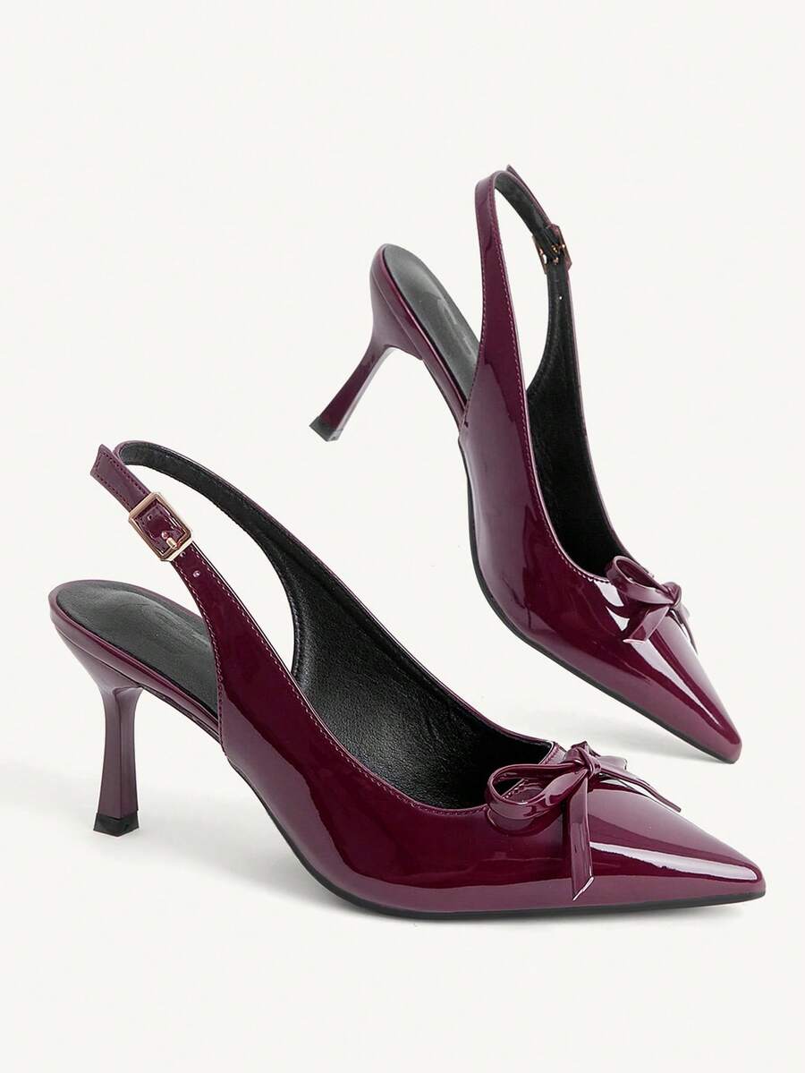 Beige pointed toe high heel pumps featuring a sleek stiletto heel and slingback strap for women.