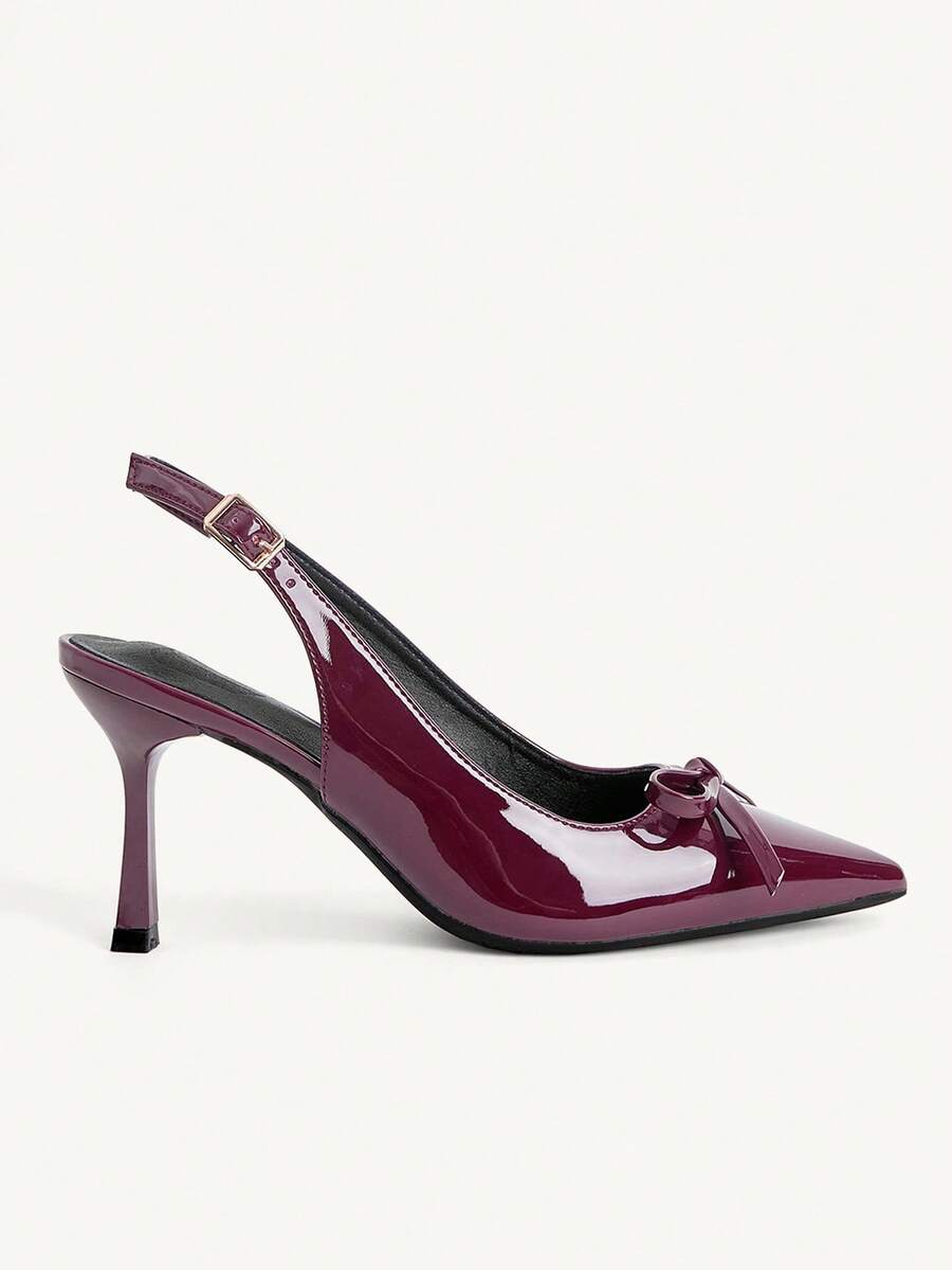 Beige pointed toe high heel pumps featuring a sleek stiletto heel and slingback strap for women.