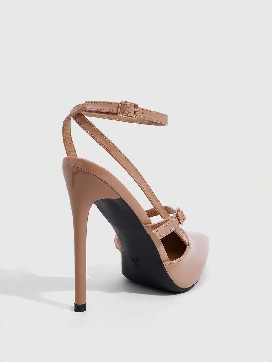 Pointed toe stiletto high heels with slingback silhouette and adjustable buckle ankle strap.