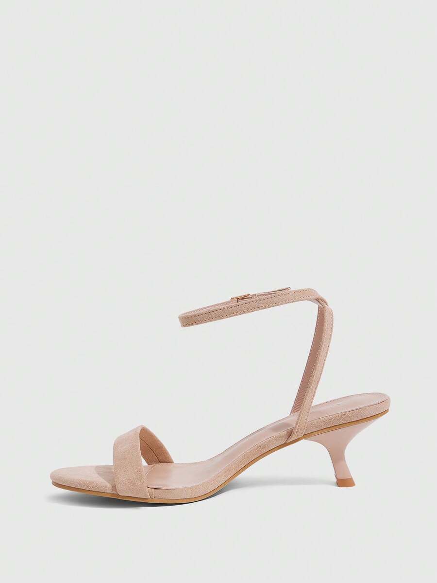 Women's open-toed high-heeled sandals featuring a 5.5cm kitten heel stiletto, sleek ankle strap with buckle closure, and smooth PU leather finish.