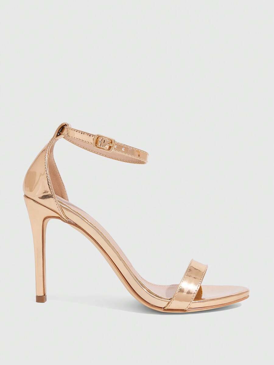 Women's stiletto sandals featuring an ankle strap buckle closure and classic round open toe design.