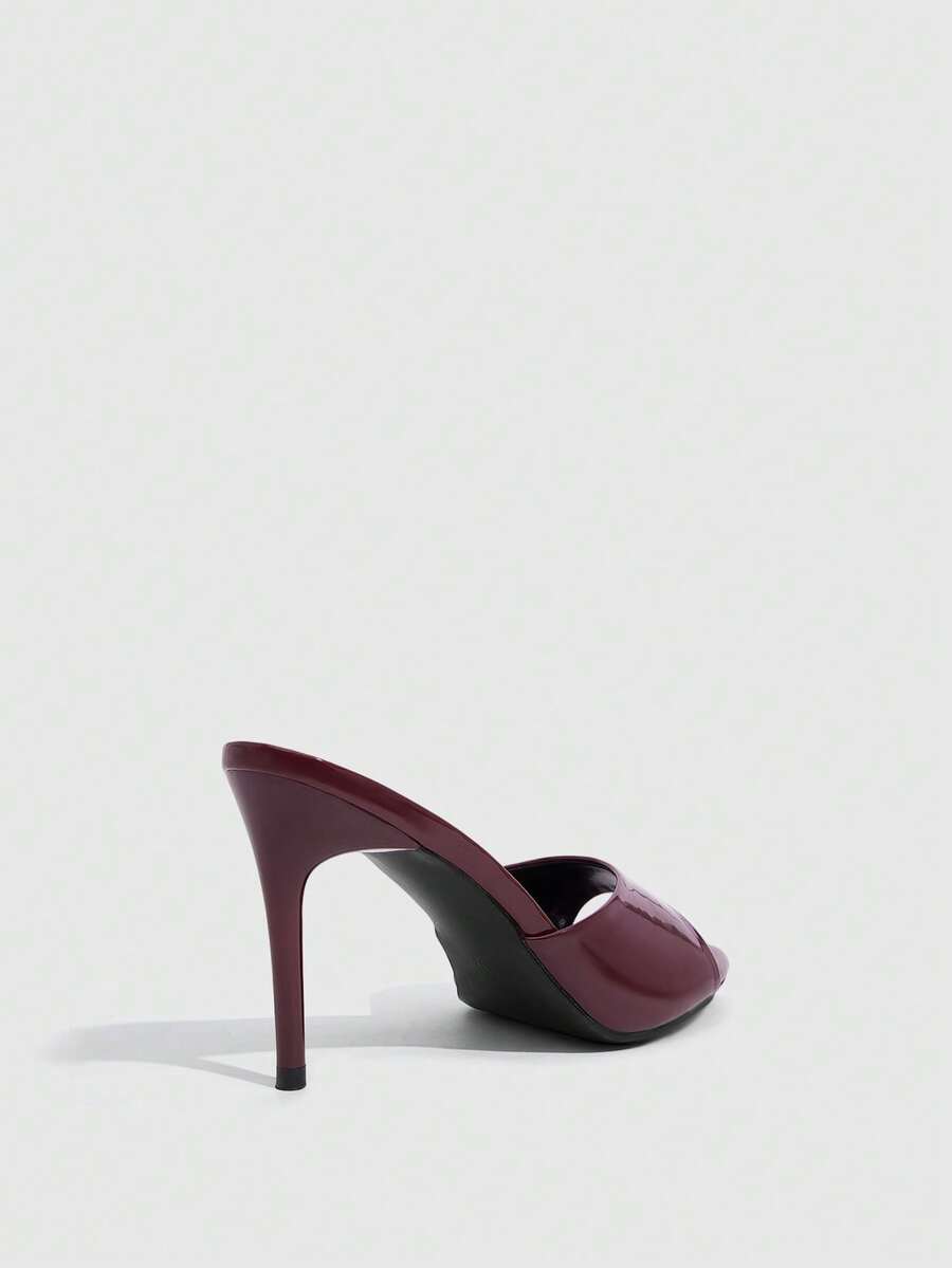 Women's open toe high heel sandals with slingback strap and sleek stiletto heel in smooth PU leather.