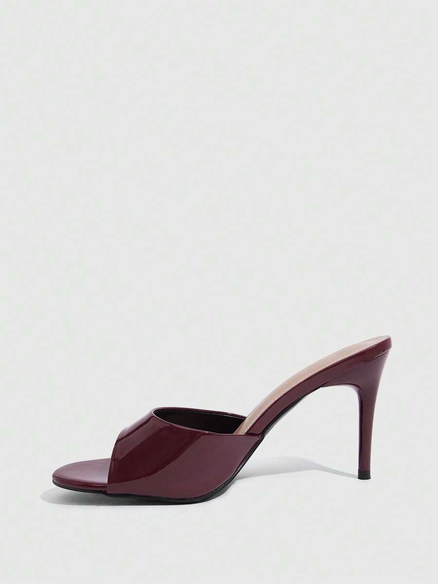 Women's open toe high heel sandals with slingback strap and sleek stiletto heel in smooth PU leather.