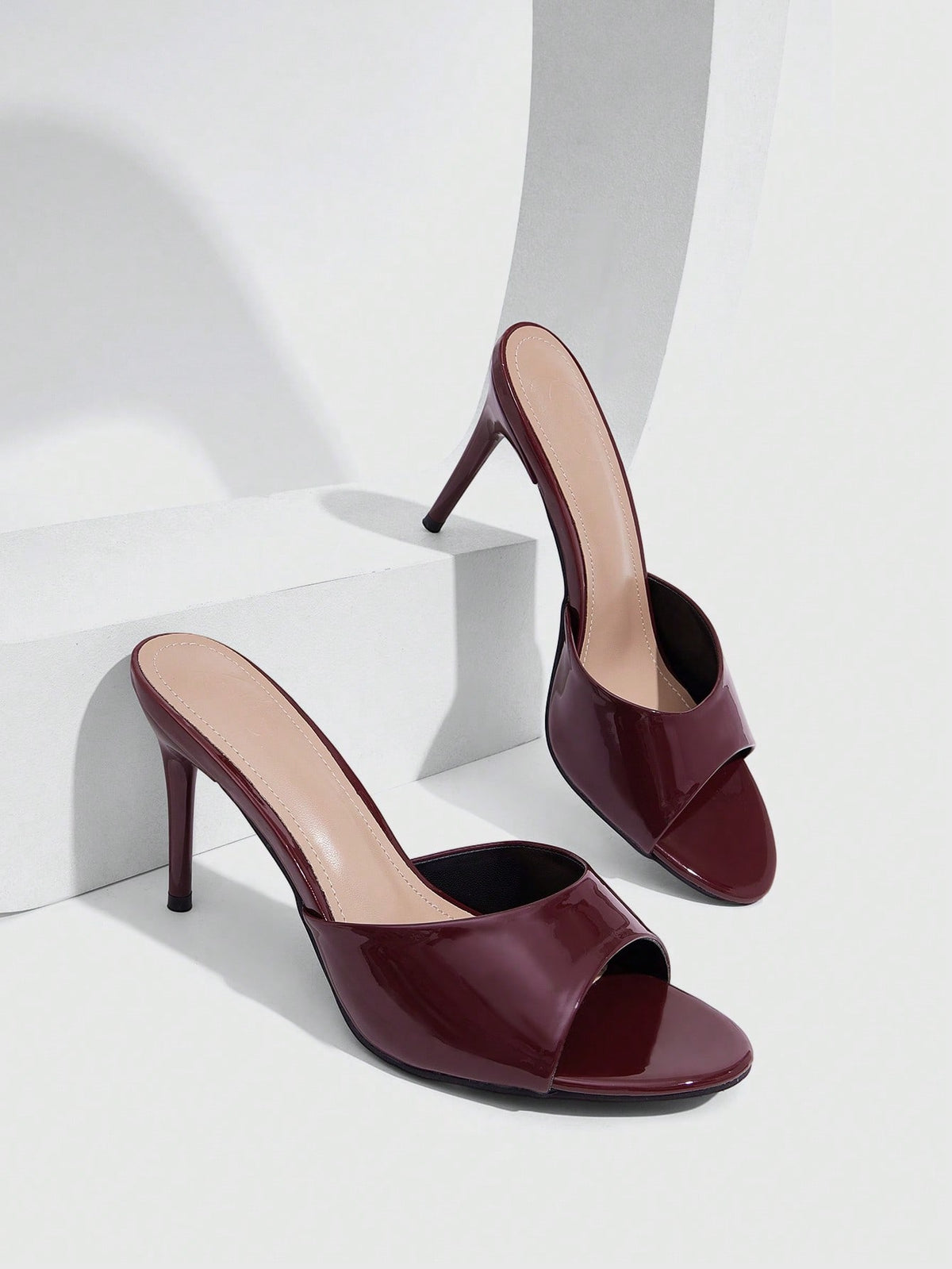 Women's open toe high heel sandals with slingback strap and sleek stiletto heel in smooth PU leather.