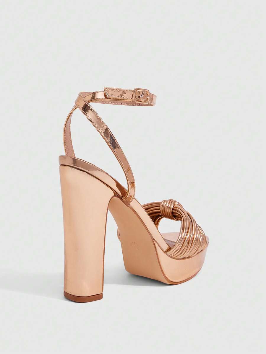Women's platform block heel sandals featuring an open toe design and an adjustable ankle strap buckle closure.