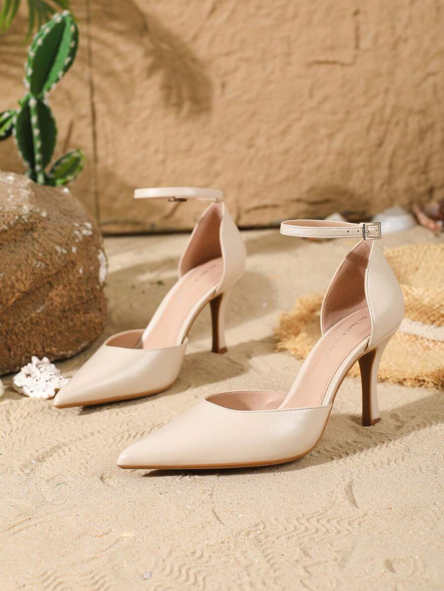 Elegant pointy-toe stiletto high heel pumps with hollow out sides and buckle ankle strap for weddings and evening dresses.