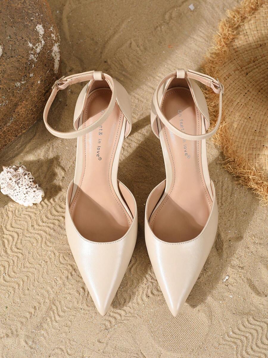 Elegant pointy-toe stiletto high heel pumps with hollow out sides and buckle ankle strap for weddings and evening dresses.