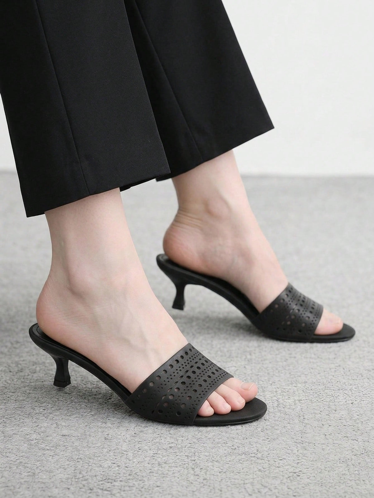 Pair of women's open toe high heel slingback sandals made with smooth PU leather