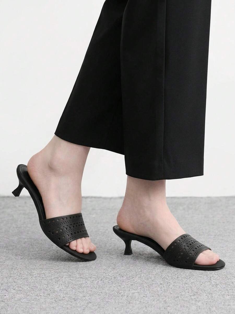Pair of women's open toe high heel slingback sandals made with smooth PU leather