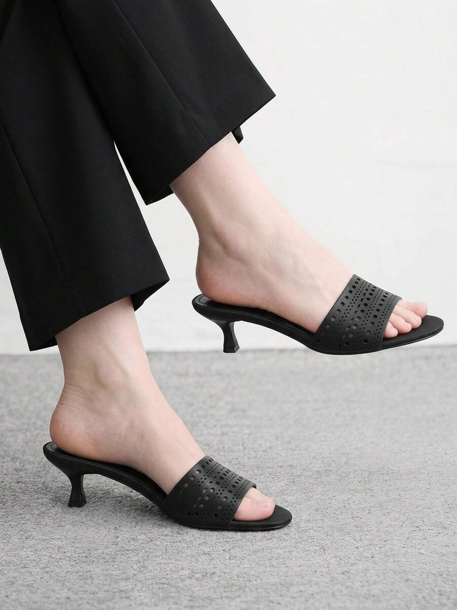 Pair of women's open toe high heel slingback sandals made with smooth PU leather