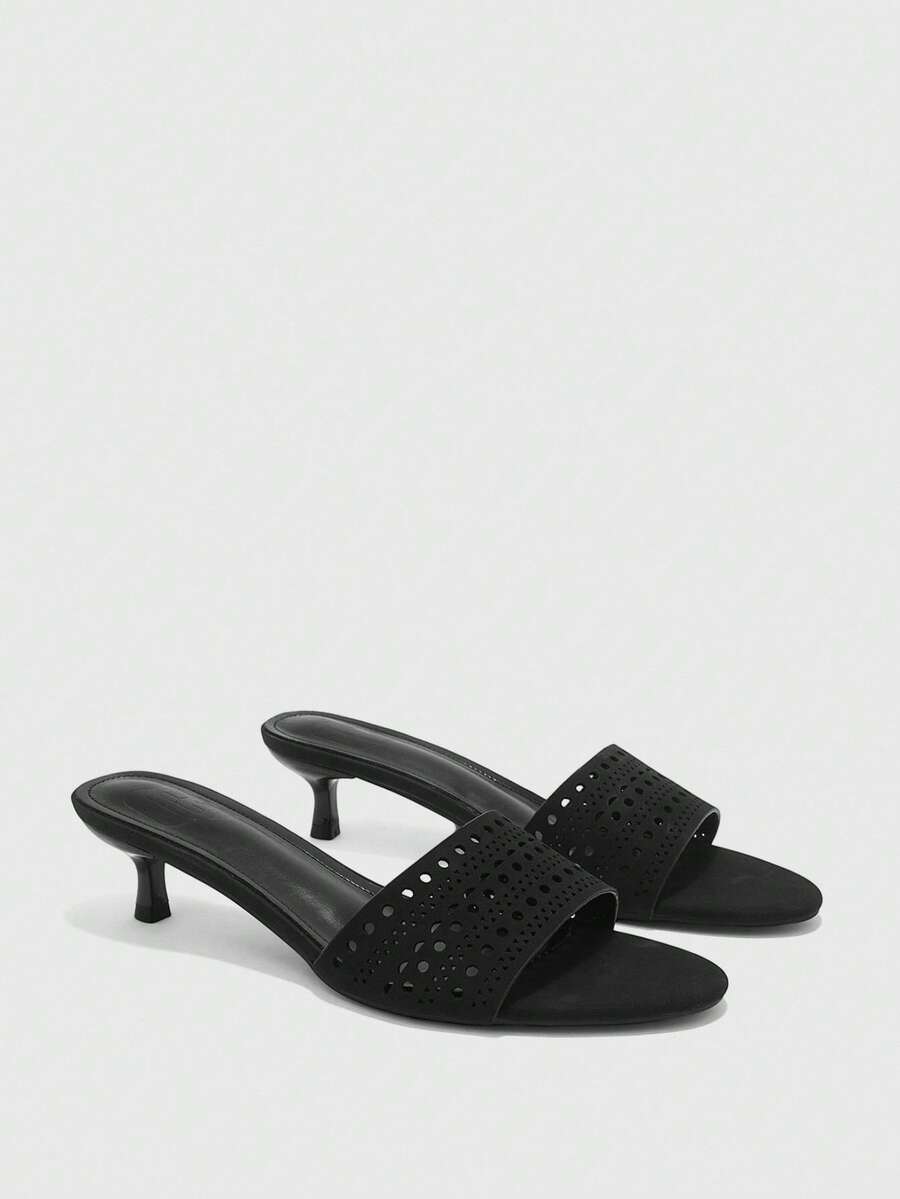 Pair of women's open toe high heel slingback sandals made with smooth PU leather