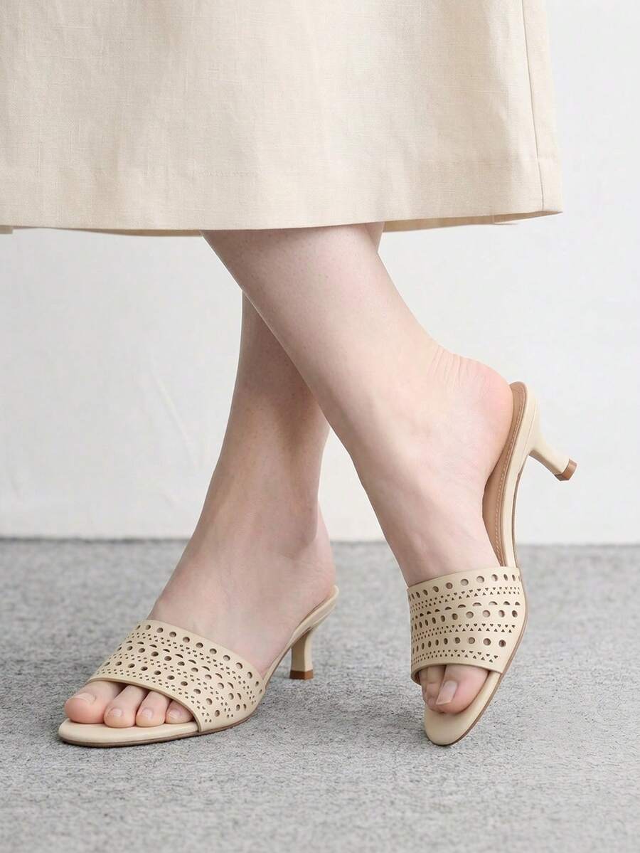 Pair of women's open toe high heel slingback sandals made with smooth PU leather