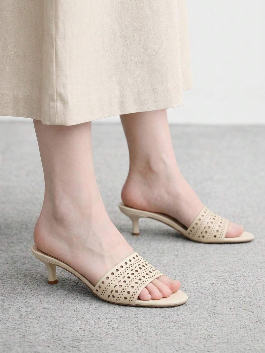 Pair of women's open toe high heel slingback sandals made with smooth PU leather