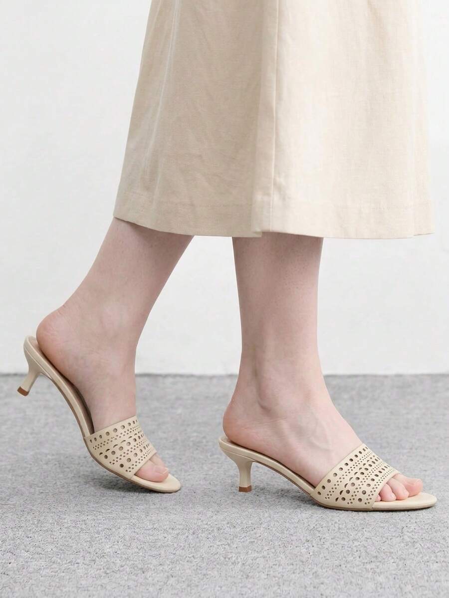 Pair of women's open toe high heel slingback sandals made with smooth PU leather