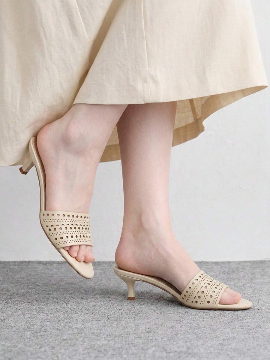 Pair of women's open toe high heel slingback sandals made with smooth PU leather