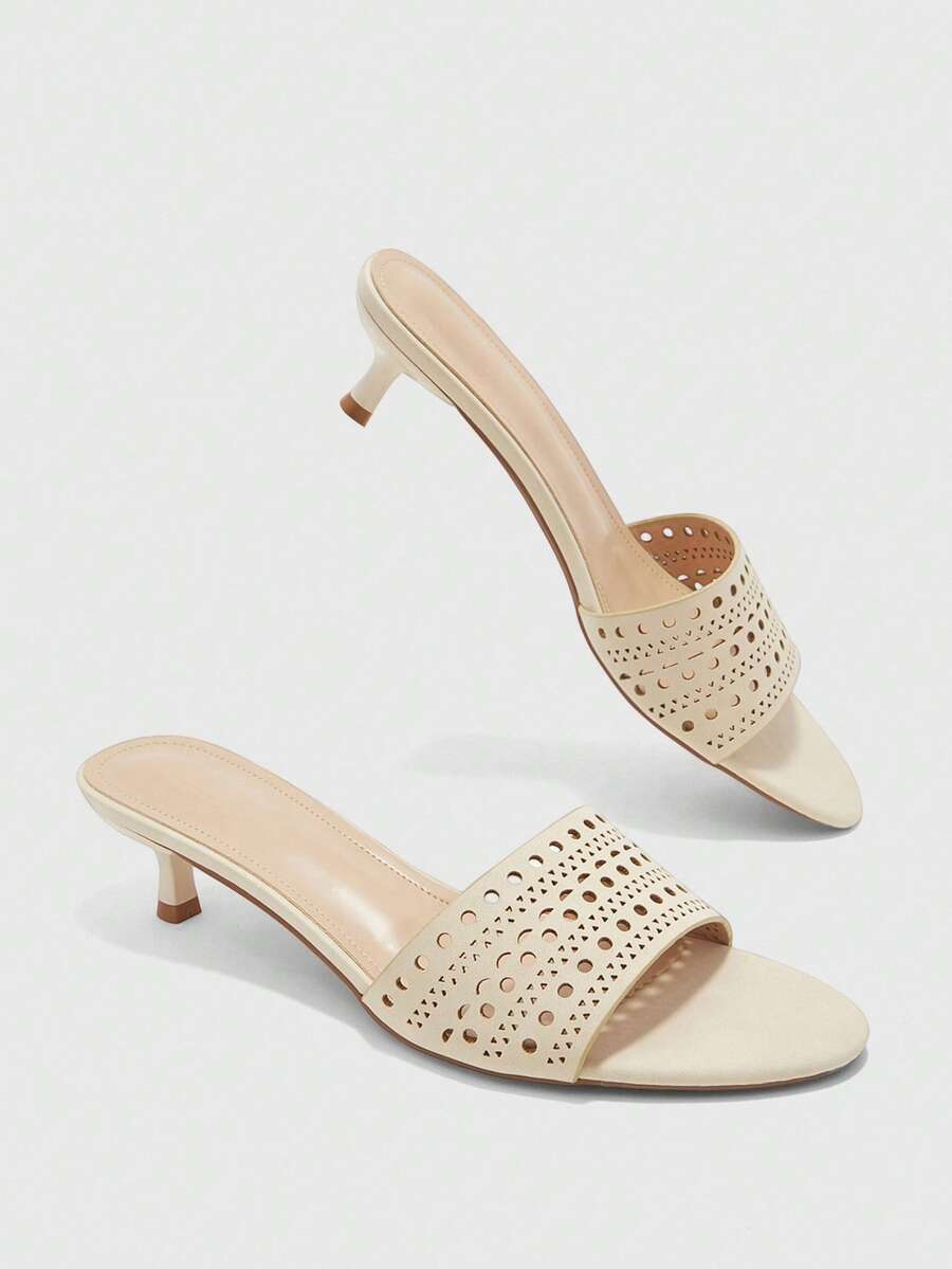 Pair of women's open toe high heel slingback sandals made with smooth PU leather
