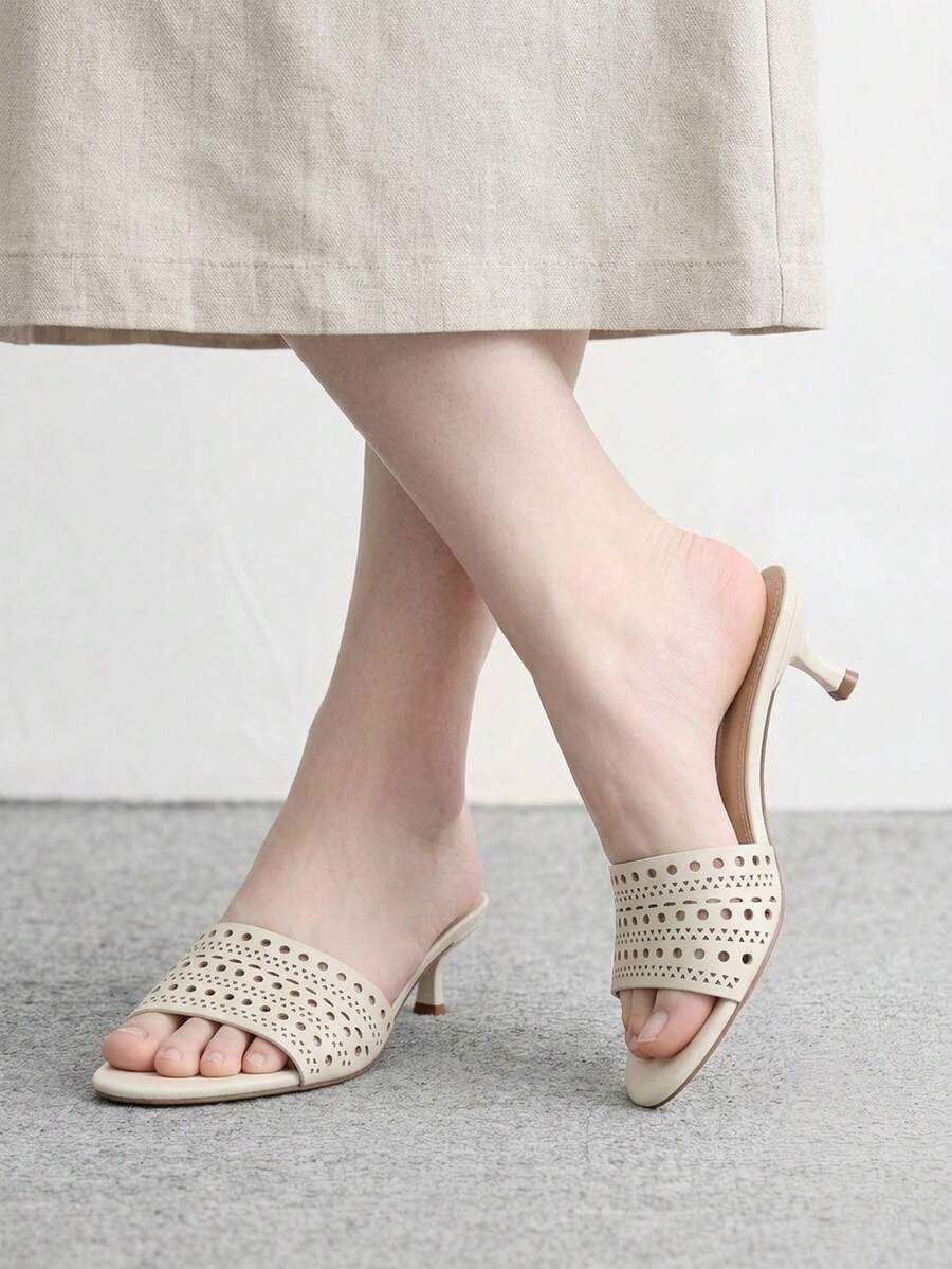 Pair of women's open toe high heel slingback sandals made with smooth PU leather