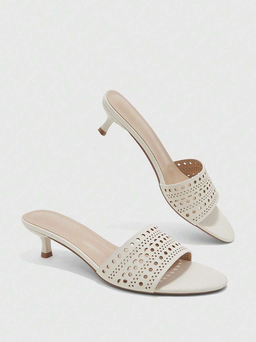 Pair of women's open toe high heel slingback sandals made with smooth PU leather