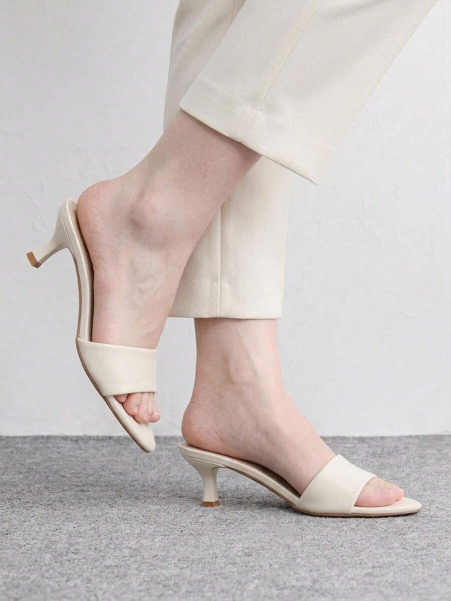 Women's slip on kitten heel mules and open toe heeled sandals in apricot
