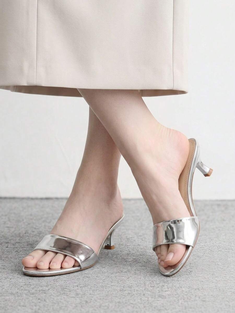 Women's slip on kitten heel mules and open toe heeled sandals in apricot