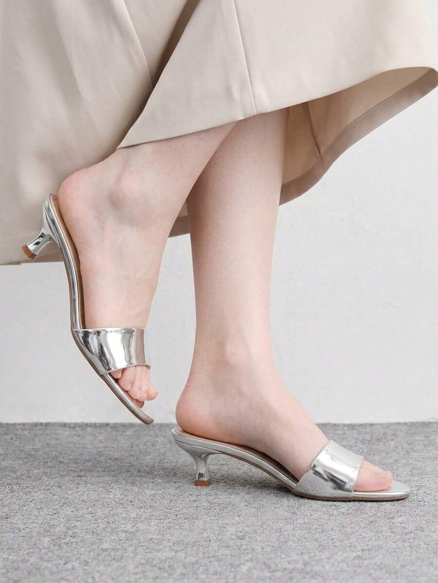 Women's slip on kitten heel mules and open toe heeled sandals in apricot