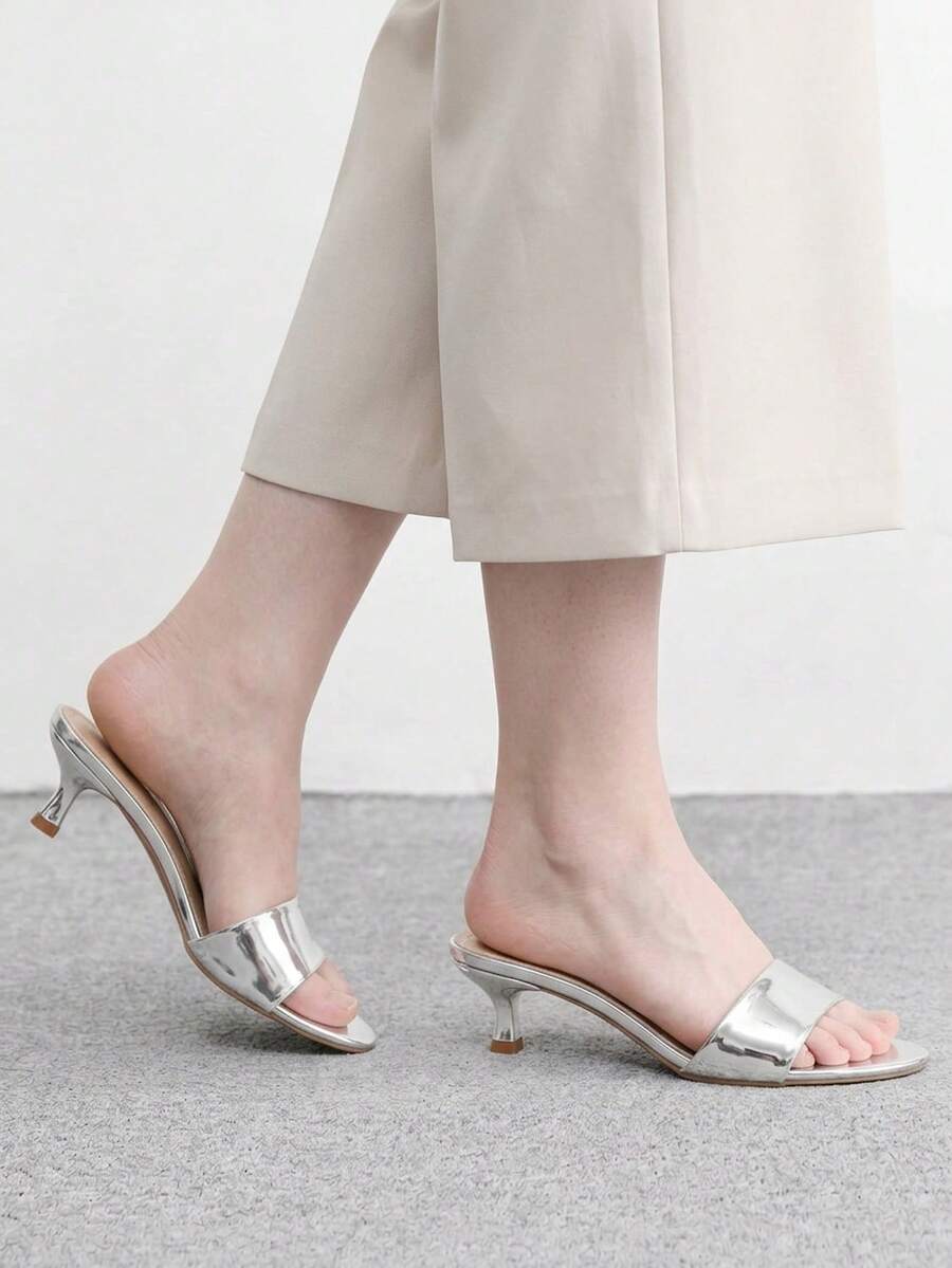 Women's slip on kitten heel mules and open toe heeled sandals in apricot