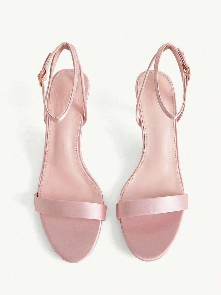 Women's open-toed high-heeled sandals featuring a 5.5cm kitten heel stiletto, sleek ankle strap with buckle closure, and smooth PU leather finish.