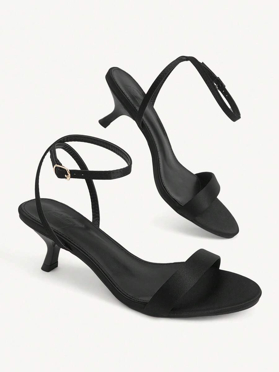 Women's open-toed high-heeled sandals featuring a 5.5cm kitten heel stiletto, sleek ankle strap with buckle closure, and smooth PU leather finish.