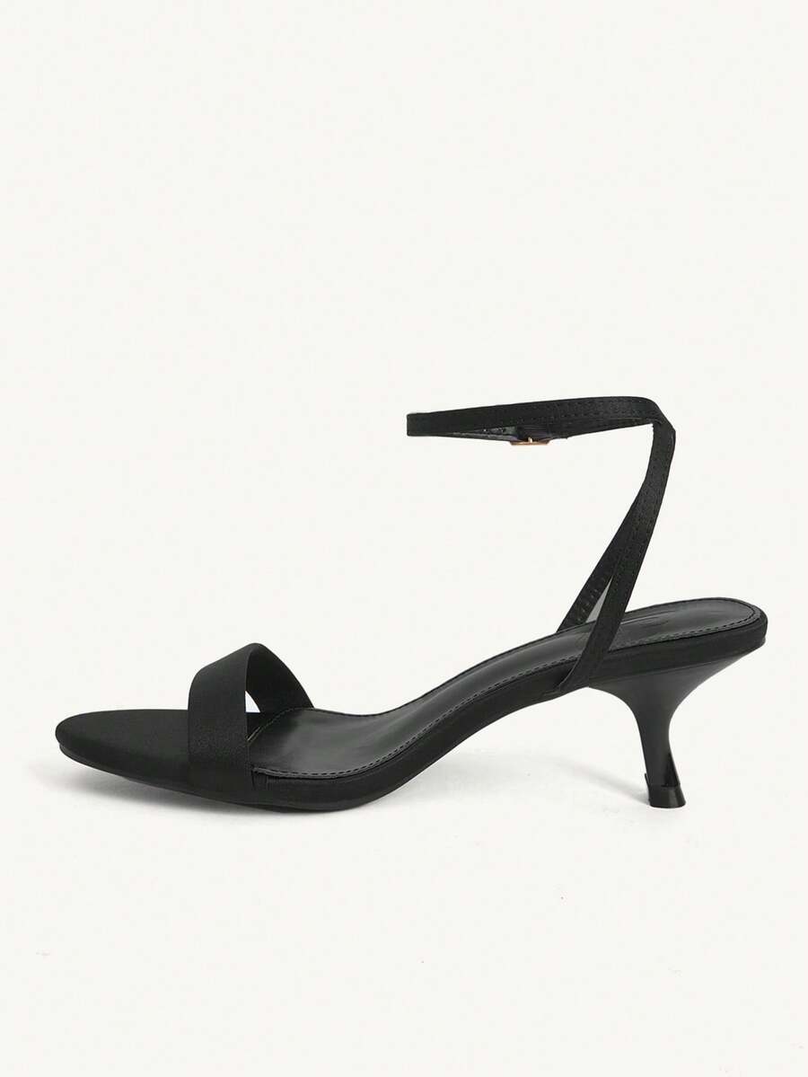Women's open-toed high-heeled sandals featuring a 5.5cm kitten heel stiletto, sleek ankle strap with buckle closure, and smooth PU leather finish.