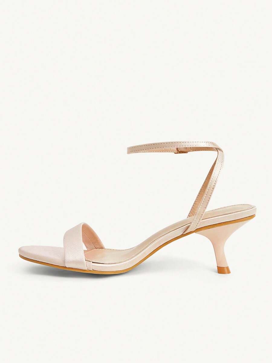 Women's open-toed high-heeled sandals featuring a 5.5cm kitten heel stiletto, sleek ankle strap with buckle closure, and smooth PU leather finish.