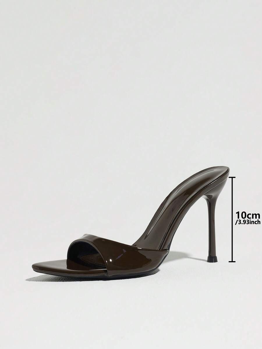Women's elegant open toe high heel party mules featuring sleek stiletto heels and a slip-on design.