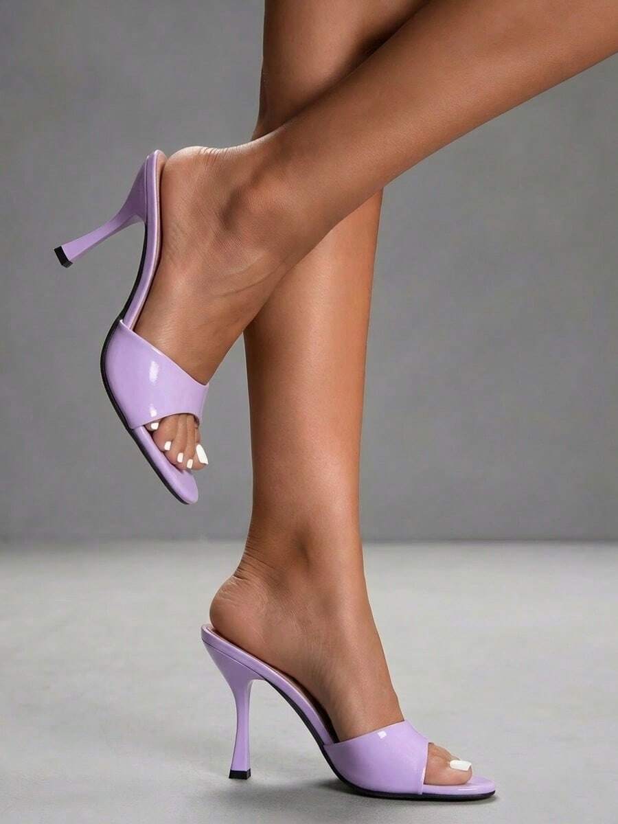Mauve purple open toe stiletto high heels slippers for women suitable for parties and evening wear.
