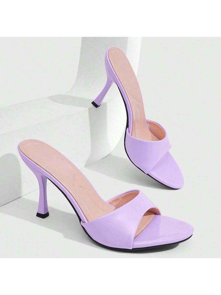 Mauve purple open toe stiletto high heels slippers for women suitable for parties and evening wear.