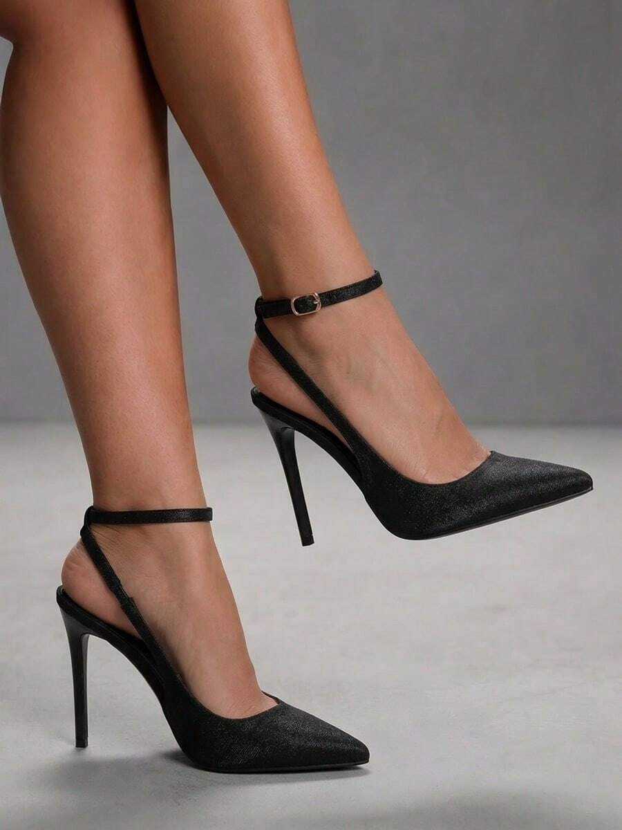Pointed toe stiletto high heels with slingback silhouette and adjustable buckle ankle strap.