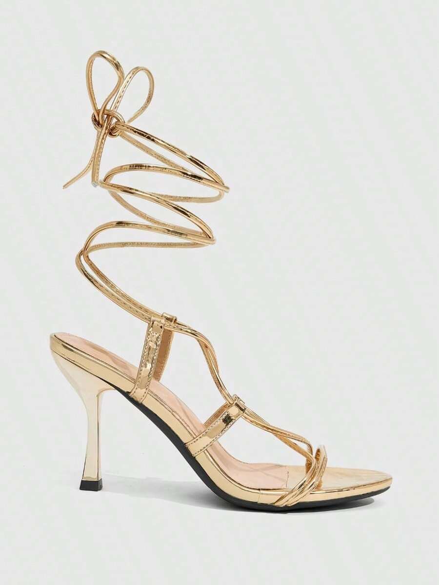 Women's open toe stiletto high heel sandals with criss cross straps and sleek PU leather finish