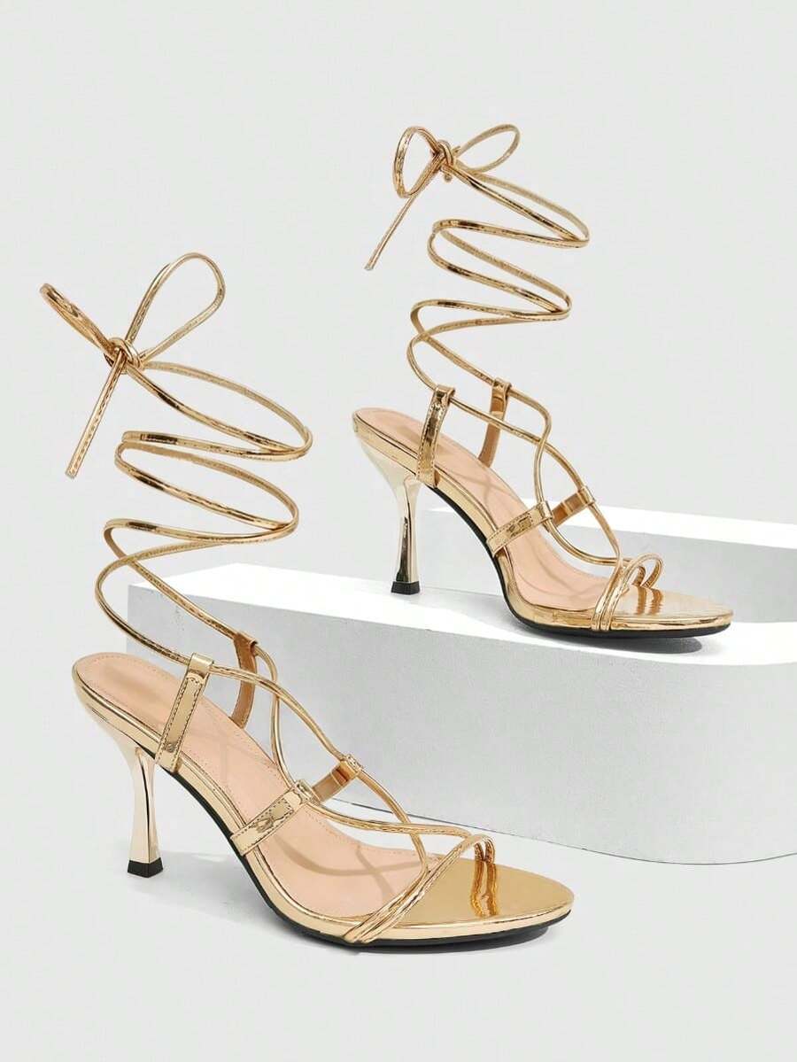Women's open toe stiletto high heel sandals with criss cross straps and sleek PU leather finish