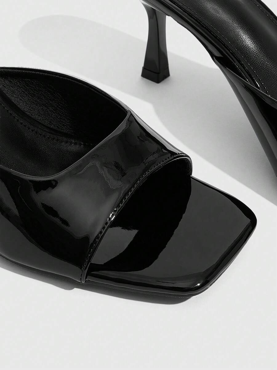 Women's elegant square toe stiletto high heel sandals featuring an open toe and sleek slingback strap