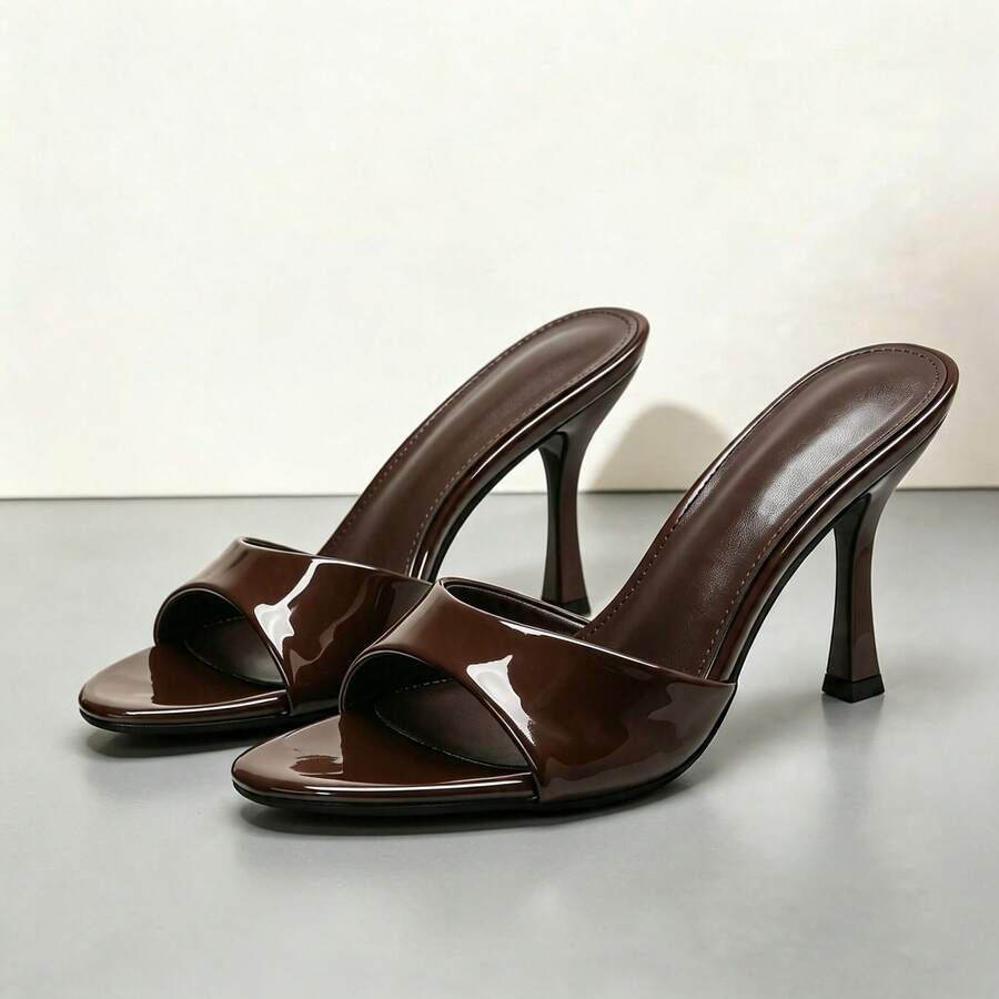 Women's open toe high heel slingback sandals with pyramid heel in solid color PU leather.