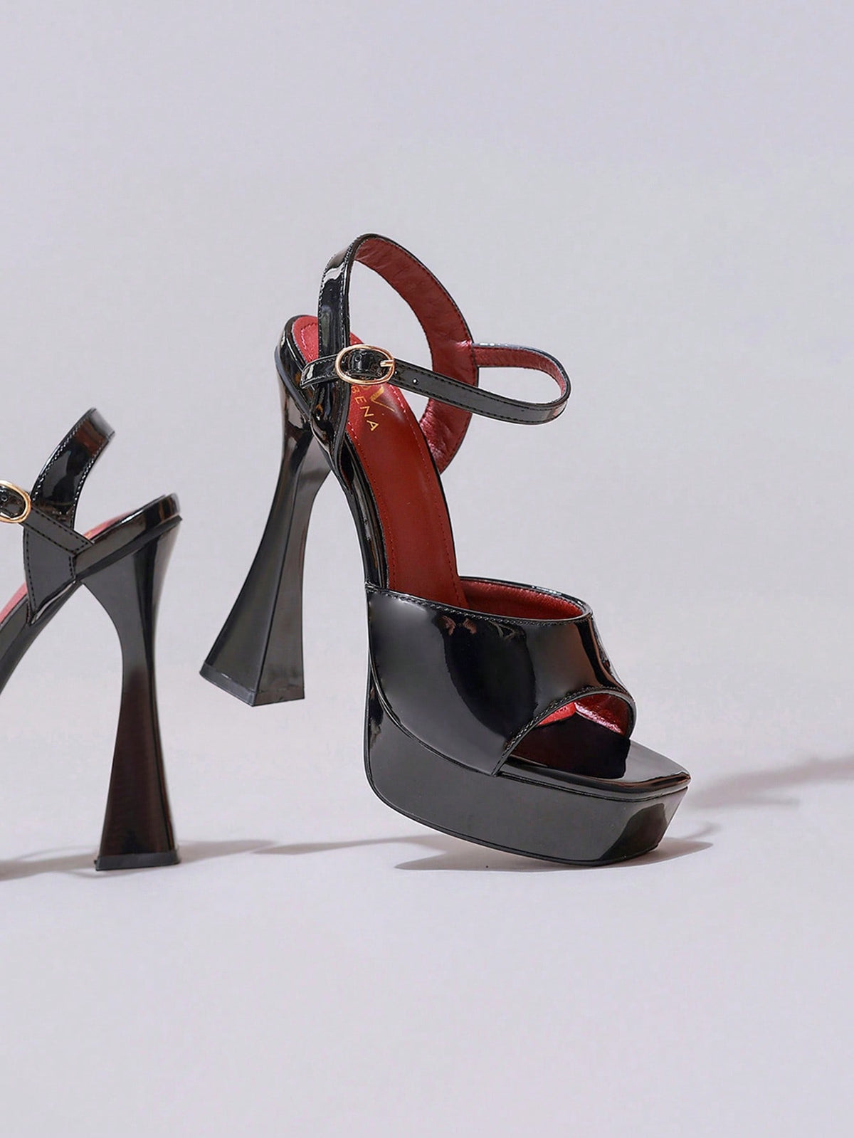 Lace embroidered open toe high heel sandals featuring a chunky square heel, platform wedge, and ankle strap buckle closure.
