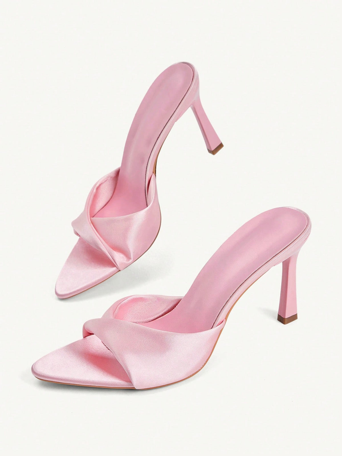 Women's peep toe high-heeled stiletto sandals with slingback strap in light metallic finish.