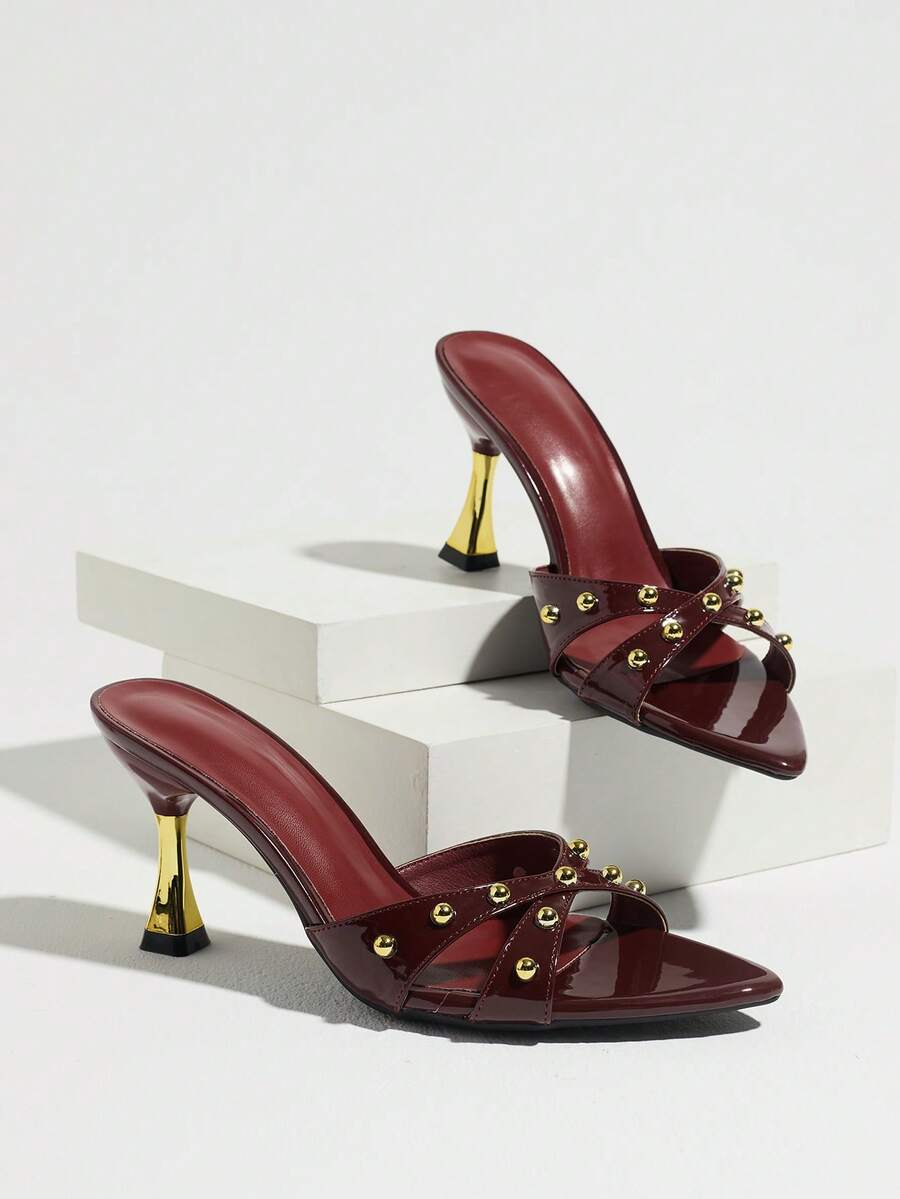 Women's pointed toe high heel mule sandals featuring a sleek slip-on design with elegant lace embroidery detailing